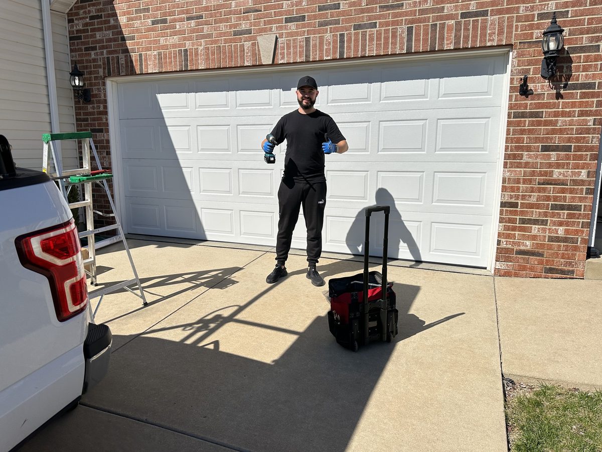 St. Louis Garage Door Repair technician at a finished job
